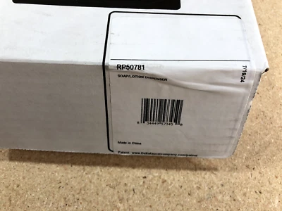 Dispensador de jabón montado en cubierta Delta RP50781 Foto 1 de 4