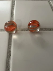 Zwei Vintage Katzenaugen-Shooter-Murmeln im Käfig - Bild 1 von 3