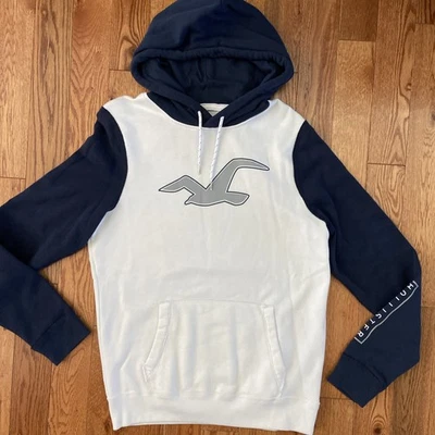Hombres HOLLISTER Talla Grande Sudadera con Capucha Marfil y Azul Deletreada en la Manga *COMO NUEVA* Foto 1 de 4