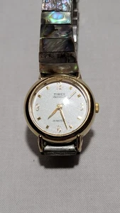 Timex Indiglo DAMENUHR CR 1216 MIT ABALONE SHELL STRETCH BAND NEUE BATTERIE - Bild 1 von 14