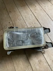 Faro izquierdo sin intermitentes Audi 80 B2 año 80 año 80 H4 original Hella 002-121717 - Imagen 1 de 5