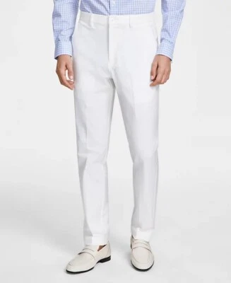 Pantalones elásticos Michael Kors para hombre calce clásico 42 x 32 nuevos con etiquetas blanco roto frente plano MK Foto 1 de 4