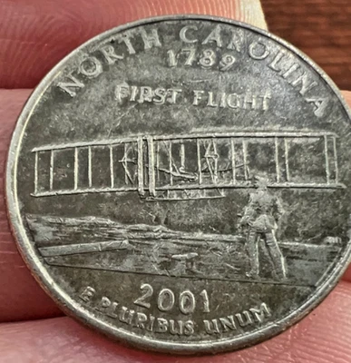 Moneda de error de belleza negra de cuarto de dólar 2001-P NC error de planchet recocido incorrectamente  Foto 1 de 4