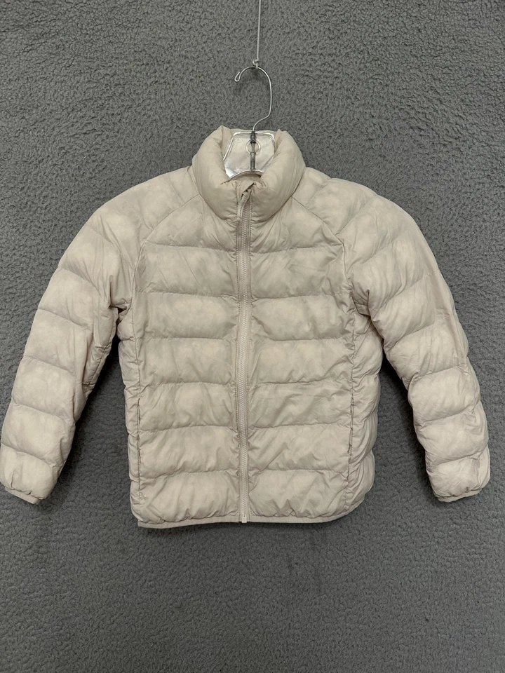 Chaqueta acolchada Uniqlo beige talla 5-6 cremallera completa niños nailon Foto 1 de 4