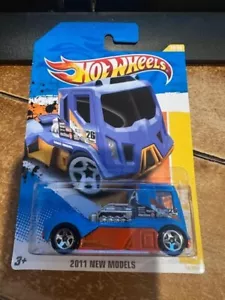 2011 Hot Wheels New Models Rennen Rig #19 Blue/Orange - Picture 1 of 1
