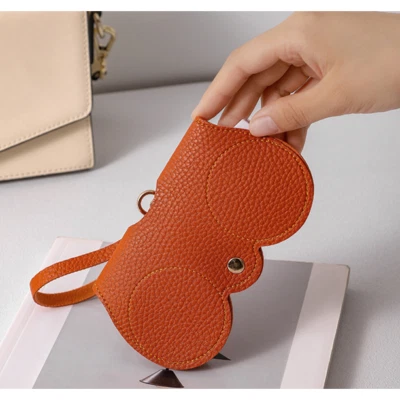 Bolsa de gafas de sol de cuero sintético suave portátil bolsa de gafas de sol en naranja Foto 1 de 4