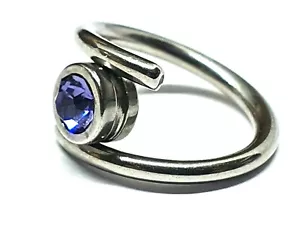 Tanzanite Twist Ring 12mm Drum Lock Acciaio 316L 14g (1,6mm) Orecchio Cartila... - Foto 1 di 12