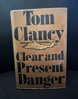Clear and Present Danger Tom Clancy 1989 HCDJ Signed 1st Ed 1st Print Spot Cover - Image 1 of 4