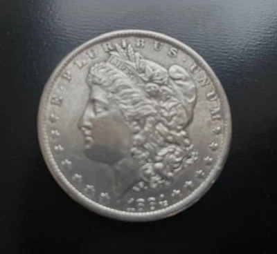**RARO** DÓLAR DE PLATA 1884 E PLURIBUS UNUM MORGAN Foto 1 de 3
