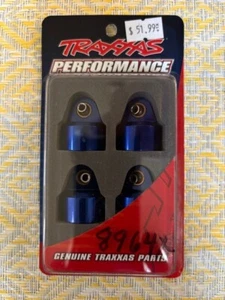 Traxxas Part #8964X: Shock caps, aluminum (blue-anodized), GT-Maxx® shocks (4) - Picture 1 of 1