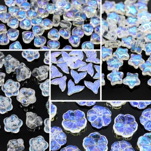 50 X SMOOTH GLASS HEART / STAR / FLOWER /MERMAID TAIL BEADS CLEAR AB - Picture 1 of 6