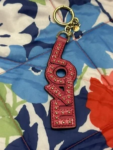 Michael Kors Studded Leather LOVE Bag Charm Pink Gold NWT $48 PHOTOS!🆓🇺🇸🚢 - Picture 1 of 3