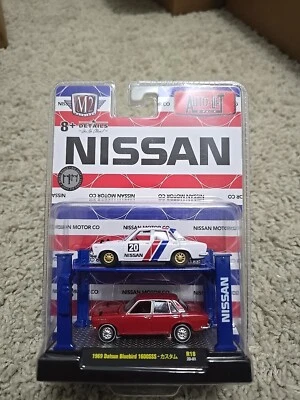 M2 Machines Auto Lift 2-Pack -1969 Datsun Bluebird  1600 SSS Diecast Car Set R18 - Image 1 of 4