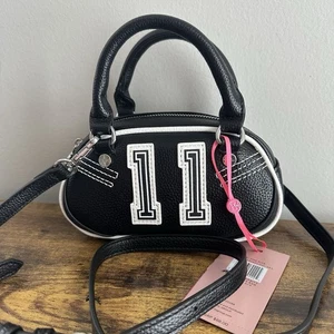 New Paris Hilton Mini Varsity Bowler Bag Crossbody PH Black White Cute 11 - Picture 1 of 5