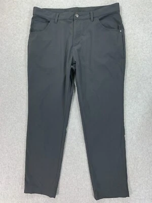 Pantalones informales Adidas Tech delanteros planos (hombre 34x30) grises Foto 1 de 4