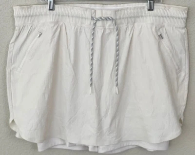 ATHLETA Trekie 弹力短裙象牙色面霜前拉链口袋 WMS 尺寸 18 — 第 1/4 张图片