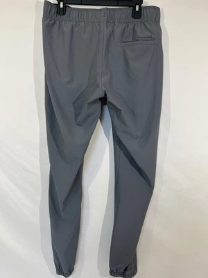 Pantalones de rendimiento de golf Travis Mathew abiertos a cerrar 34x329 grises Foto 1 de 4