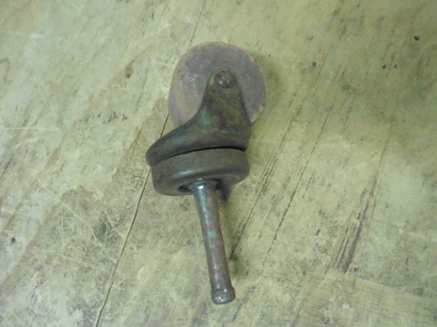 Vintage steel and wood caster roller swivel Cover