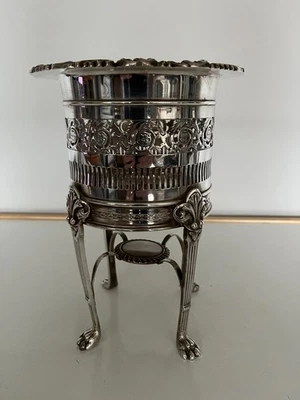 HERMOSO SOPORTE/CALENTADOR PARA BOTELLAS DE VINO VICTORIANO PLATEADO EN 4 PIES Foto 1 de 4