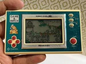 Nintendo Game & Watch DONKEY KONG JR -DJ-101 REPUESTOS COMO ESTÁ Auténtico buen estado - Imagen 1 de 19