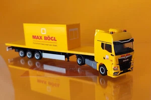 Herpa 318556 MAN TGX GX Flachbett-SZ mit Bürocontainer "Max Bögl" 1:87 NEU - Picture 1 of 2