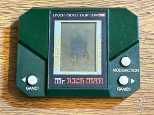 LSI GAME LCD EPOCH POCKET DIGIT COM MR.RICH MAN - Picture 1 of 3