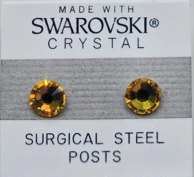 Aretes redondos amarillos dorados de cristal de 7 mm hechos con elementos de Swarovski Foto 1 de 3