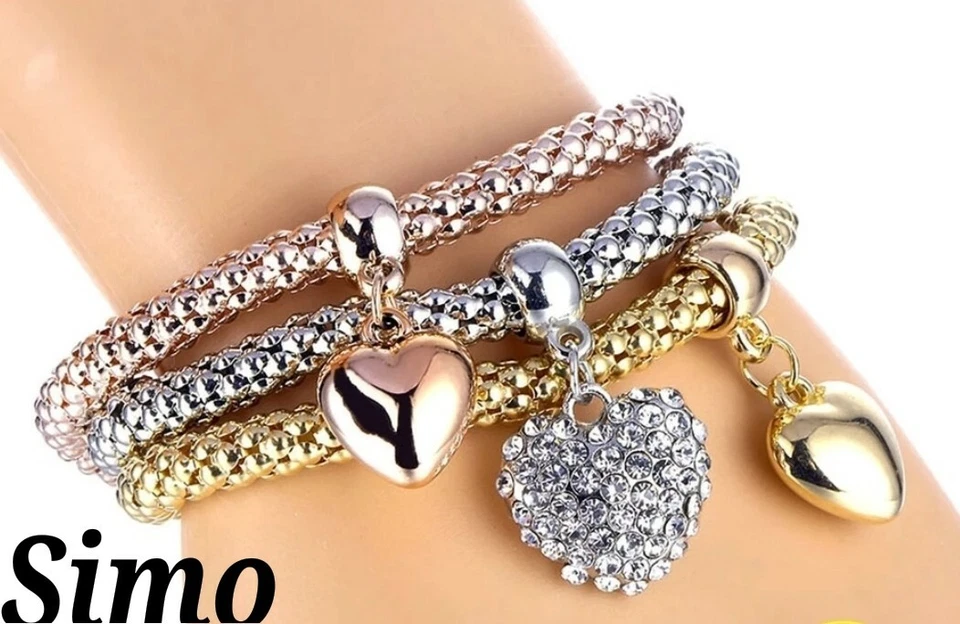 BRACCIALE DONNA ORO ARGENTO ORO ROSA ELASTICO CUORE ZIRCONI SERPENTE PENDENTE - Immagine 1 di 1