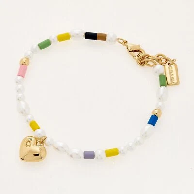 Brazalete Coach Pearl Heart Flex con cuentas chapadas en oro, caja Coach se vende por separado Foto 1 de 4