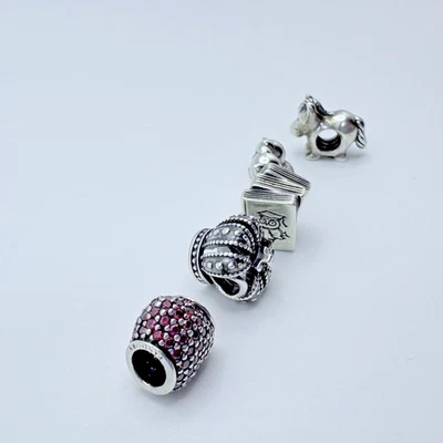 Auténticos DIJES PANDORA Lote 925 ALE Retirado Plata de Ley 5 Dijes Foto 1 de 4