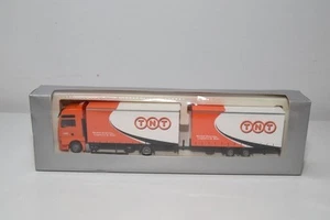 B54 1:87 AWM MAN M.A.N. TGA TRUCK WITH TRAILER TNT GLOBAL EXPRESS MIB - Picture 1 of 12