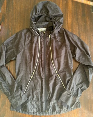 Athleta Women's Run On Windbreaker Black Reflective Silver Stripes Jacket Small - Image 1 of 4