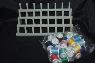 Soporte de rosca de carrete de plástico vintage 32 con 33 carretes de rosca SIN USAR Foto 1 de 4