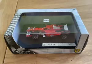 HOT WHEELS FORMEL 1 1:43 M. SCHUMACHER FERRARI 248 F1 2006 " SHELL " OVP - Bild 1 von 3