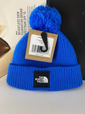 Gorro The North Face Infantil/Niños Pequeña Caja Logo Pom, Azul Héroe, XS (6-24M) Foto 1 de 4