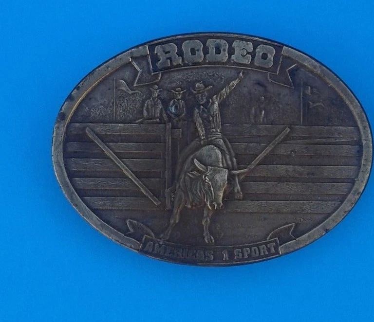 BERGAMOTA 1977 -RODEO AMERICA'S #1 SPORT- HEBILLA DE CINTURÓN V-39 3 1/2' X 2 1/2' Foto 1 de 1