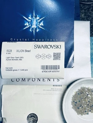 Cuentas bicono Swarovski 5328 4 mm ópalo gris claro AB 1440 piezas paquetes de sellos austriacos Foto 1 de 3