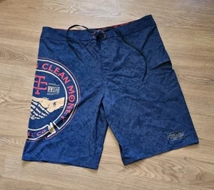 Troll Co. Haggler Boardshort Dirty Hands Clean Money Size 38 Blue Multi 10" Ins. - Picture 1 of 7