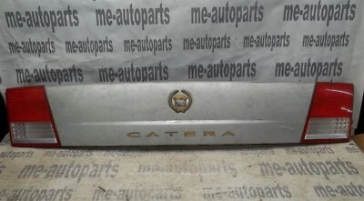 Cadillac Catera 2000 2001 acabado maletero fábrica panel tapa montaje emblema dorado Foto 1 de 4