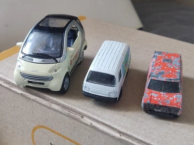 Juego 3 Carros Maisto Smart City Cupé Maisto Ford Econovan Ford Econoline E-150 Van Foto 1 de 4