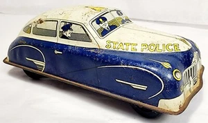 Coche mecánico litográfico vintage Walt Reach Courtland juguete de hojalata policía estatal - Imagen 1 de 7