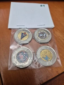 CANADIAN TOONIE Colorized $ Coin LOT OF 4 SEE PHOTOS VICTORY ETC #9 - Foto 1 di 3