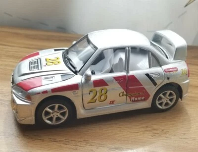 Coche de juguete Kinsfun Racing plateado Mitsubishi Evolution IV tirar hacia atrás fundido a presión 1:41  Foto 1 de 4