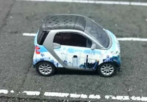 Busch H0 46119 Smart Fortwo 07 Puzzlesmart "skyline" NEU & OVP - Picture 1 of 5