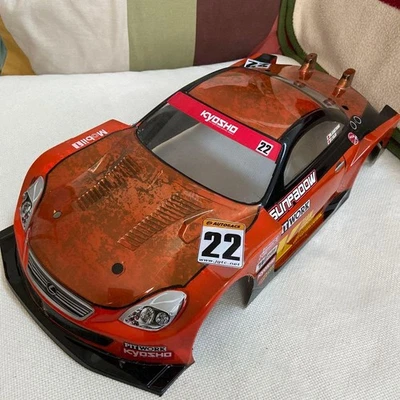 Cuerpo de radio control Kyosho 1/10 Lexus, naranja, usado, dañado Foto 1 de 3