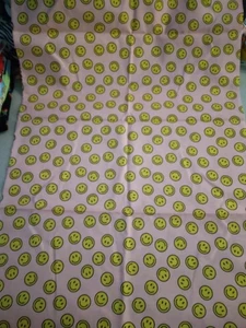 Smiley on light pink fabric 1 yard 277893 - Picture 1 of 2