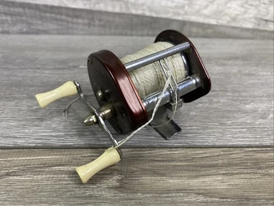 Carrete de pesca fundido con cebo Bronson Veteran 1100 Foto 1 de 4