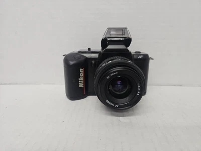 Cámara Nikon N4004 35 mm SLR con lente AF Nikkor 35-70 mm 1:3,3-4,5 probada Foto 1 de 4