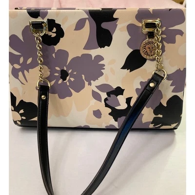 Bolso de mano Anne Klein estampado floral negro gris tostado dorado león encanto Foto 1 de 4
