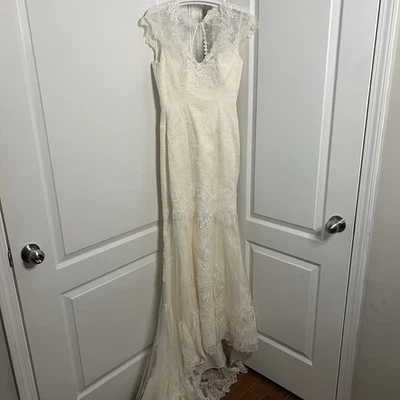 Vestido de novia Winnie Couture marfil encaje talla 2 con manga gorra Foto 1 de 4